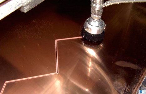 Waterjet cutting through copper